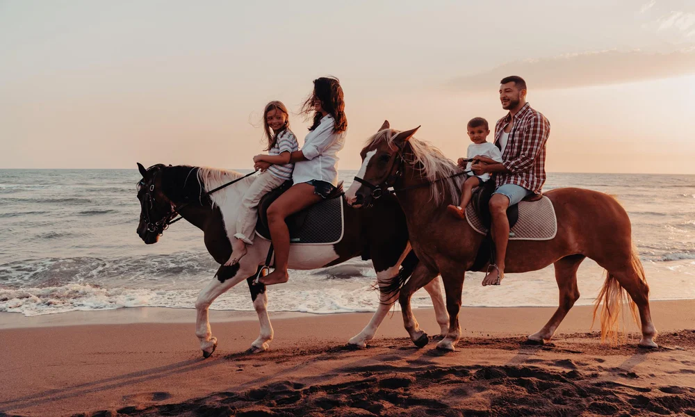 Montar a caballo en la playa
